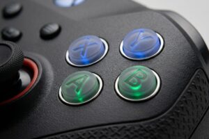 A translucent and backlit silicone keypads for gaming controllers