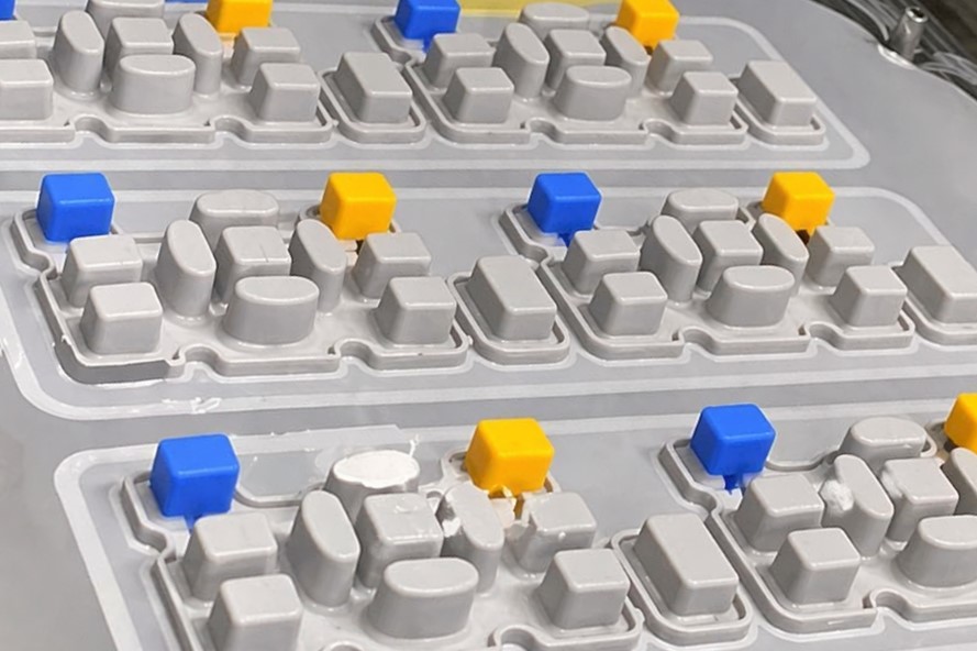 waterproof and colorized silicone keypad formed by compression molding process