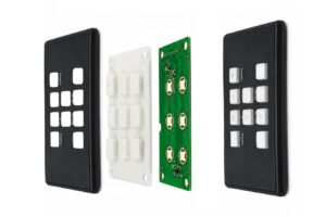 Construction of integrated silicone rubber keypad with outer plastic housing