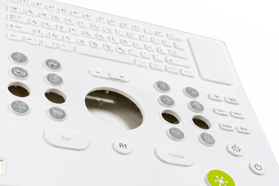 Waterproof silicone keypad with environmental resistance integrated with white housing for user interface