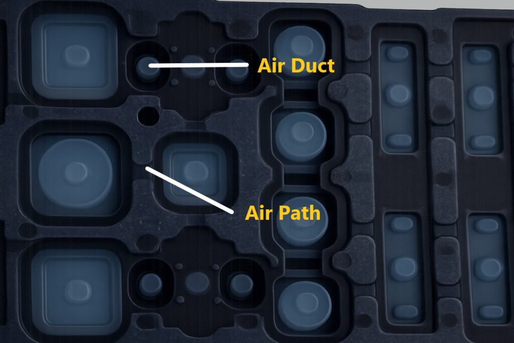 Air path and air duct design in a silicone rubber keypad for improved operation experience