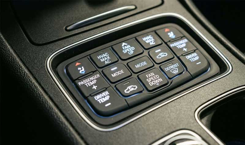 Evenly backlit Light Guide Silicone Keypads integrated into a modern car central console