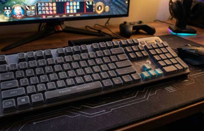 A custom silicone keyboard cover fitted over a gaming computer keyboard on a dark desk setup