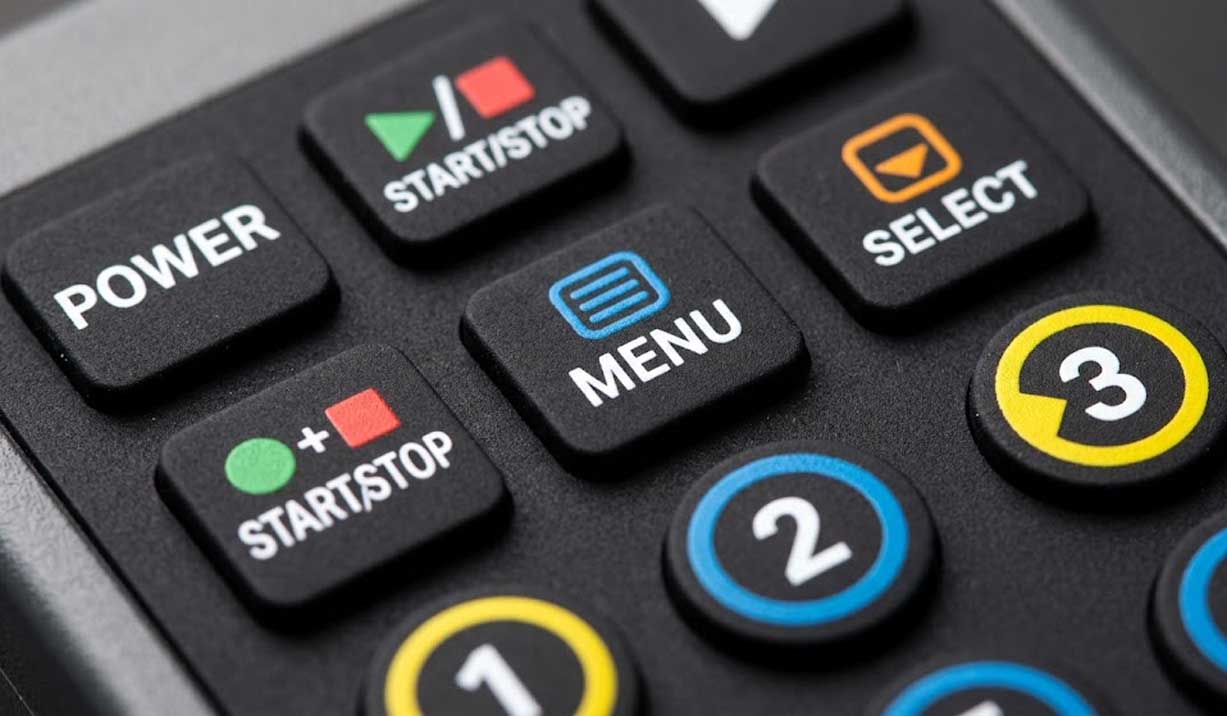 Detailed macro view of a screen printed silicone keypad with colorful legends and durable ink details on matte keys